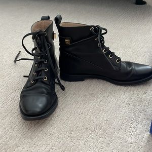 Stuart Weitzman black leather combat boots w/ gold detailing. 36